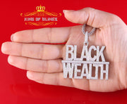 King Of Bling's White 925 Sterling Silver BLACK WEALTH Sign Pendant with 9.30ct Cubic Zirconia KING OF BLINGS